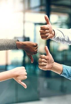 Were split on this decision. a group of unrecognizable businesspeople gesturing Stock Photos