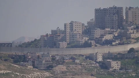 West bank Jerusalem. Wall divide between Israeli and Arab Stock Footage 80380916
