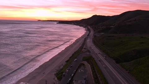 West Coast Cali Sunset over PCH Highway Traffic along Coastal Beach Stock Footage 337589885