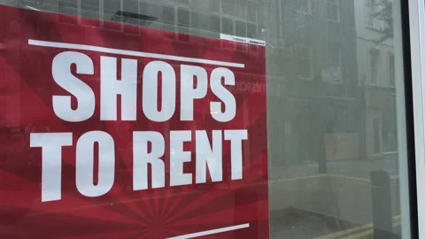 A West End London empty shop. Window sign poster advertising shops to rent. Stock Footage 164960193