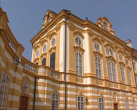 West front and courtyard of Benedictine Abbey + tilt up bell towers Stock Footage 33765174