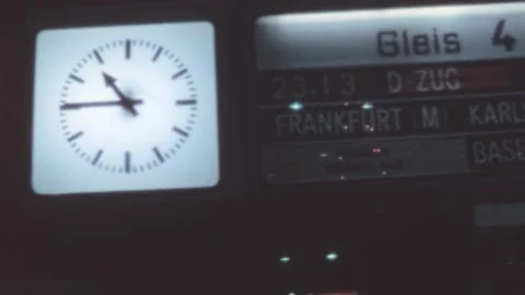 West Germany - 1984: Train schedule display indicates time and destinations Stock Footage 304963634