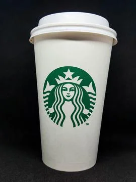 West Java, Indonesia in October 2022. A white paper cup with the starbuck log Photos