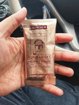 West Java, Indonesia in October 2022. A hand is holding a Turkish coffee sach 스톡 사진