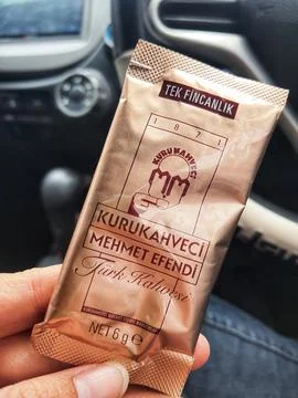 West Java, Indonesia in October 2022. A hand is holding a Turkish coffee sach Stock Photos