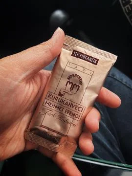 West Java, Indonesia in October 2022. A hand is holding a Turkish coffee sach Stock Photos