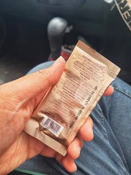 West Java, Indonesia in October 2022. A hand is holding a Turkish coffee sach Stock Photos