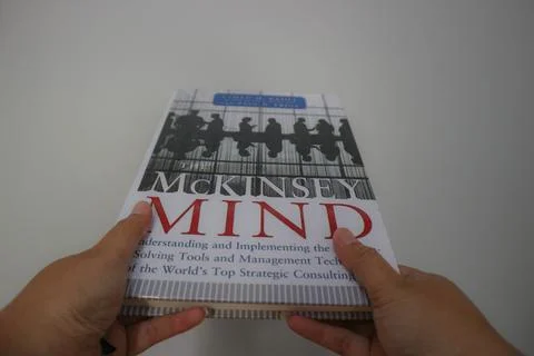 West Java, Indonesia on October 2022. A hand is holding a best selling book.. Stock-Fotos