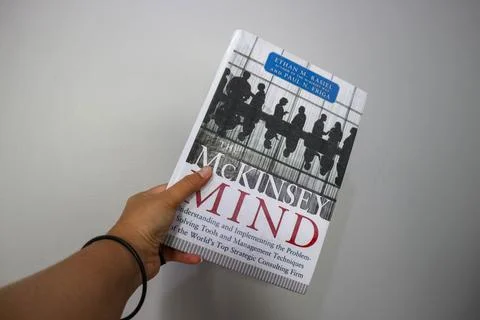 West Java, Indonesia on October 2022. A hand is holding a best selling book.. Stock Photos