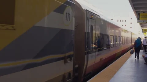 West Palm Beach, Florida, USA, December 25, 2025, Brightline Passenger Train Stock Footage 338323364