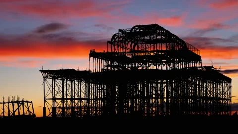 West Pier Skeleton at Twilight, Time Lapse with Colourful Sky, Brighton Stock Footage 168366524