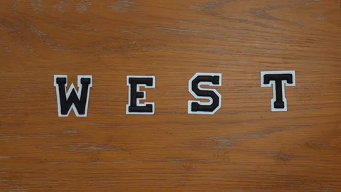 WEST varsity patch on a table Stock Footage 93616217