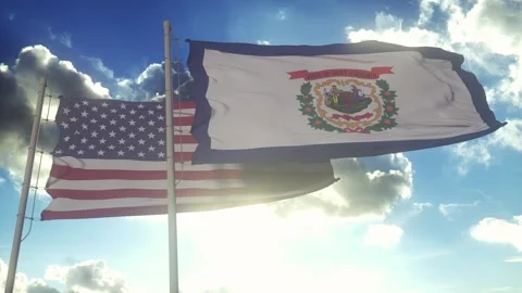 The West Virginia state flags waving along with the national flag of the United Vídeos de archivo 269403410