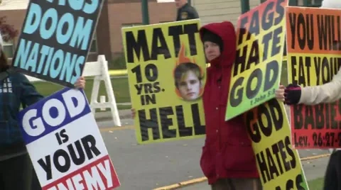 WestBoro Baptist church children at protest Stock Footage