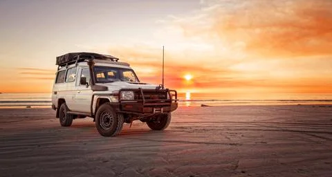 Western Australia  Outback adventure with 4WD car at the beach of an ocean at Stock Photos