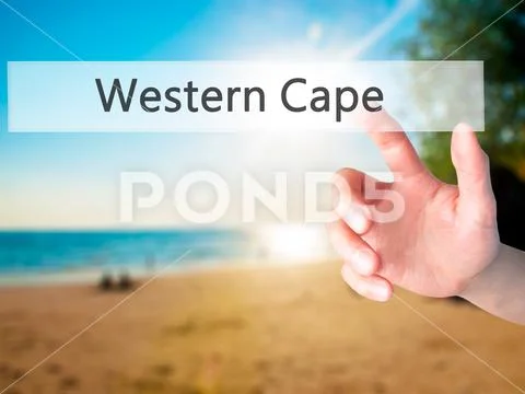 Western Cape - Hand pressing a button on blurred background conc Stock Photos