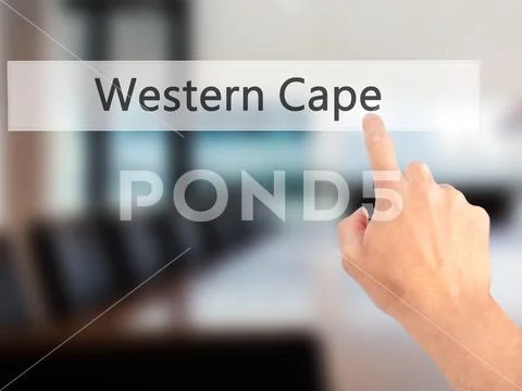 Western Cape - Hand pressing a button on blurred background conc Stock Photos