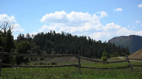 Western Fence and Cloud Time Lapse Stock Footage 34517832