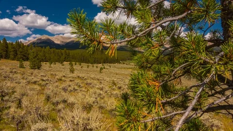 The Western Plains with a massive Mountain Range  slider Time Lapse 4K Stock Footage 129354094