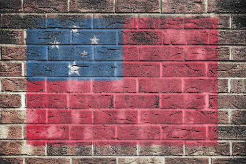 Western Samoa flag on old brick wall background Stock Illustration