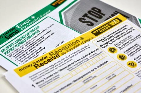 Western Union forms on a white background. Photos