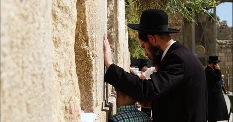 Western Wall Men Praying boy 4K Stock Footage 128659514