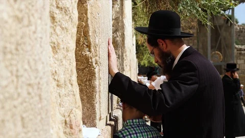 Western Wall Men Praying boy HD Stock Footage 128659610