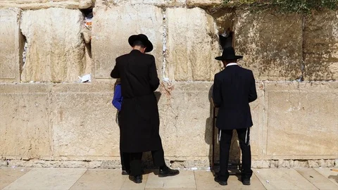 Western Wall Men Praying boy 2 HD Stock Footage 128710981