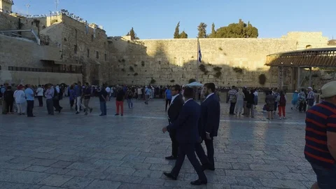 Western Wall Preparing For Shabbat friday afternoon tourists and Ultra-ortodox Stock Footage 110356408