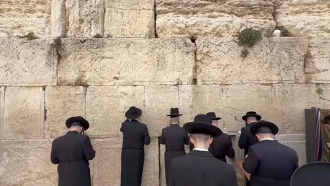 The Western Wall reopens for prayer following the lifting of restrictions, Jerus Stock Footage 332443735