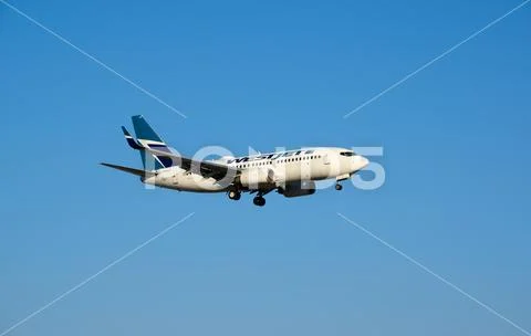 WestJet C-FWSO Boeing 737 landing. Stock Photos