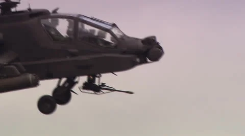 Westland Apache Helicopter Gunship close shot of gun Stock Footage 22514907