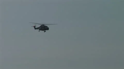 Westland lynx doing loop in sky blue military helicopter Video stock 41874389