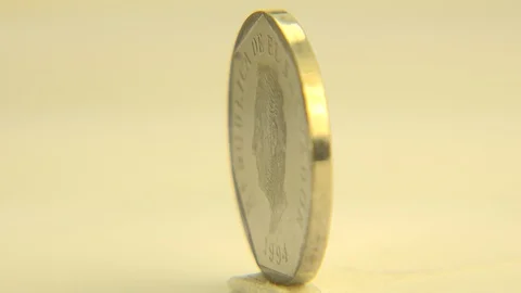 WESTMINSTER COLORADO-2015: Close Up Rotating Clockwise Gold Coin Value At Stock Footage 129328341