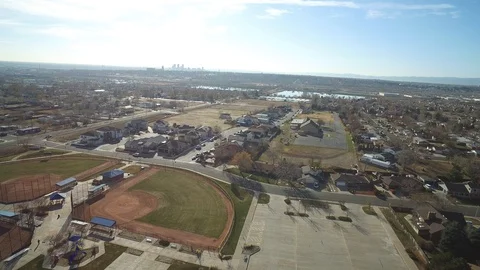 WESTMINSTER COLORADO-2016: Sky View Of A Neighborhood With A Baseball Field And Stock Footage 129764496