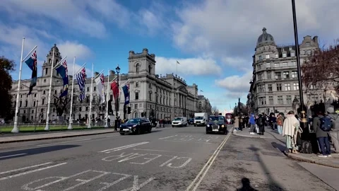 Westminster Traffic With White Van Black Taxi and Parliament Square Buildings Stock-Footage 322509722
