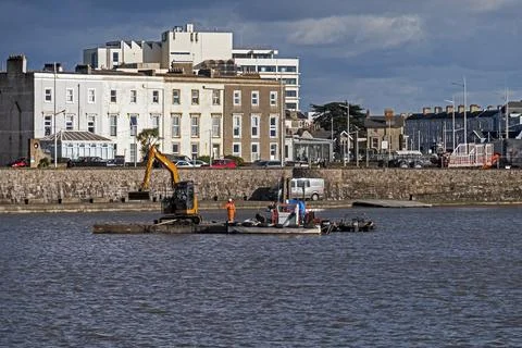 WESTON-SUPER-MARE, UK - 2/26/2024: Dredging the Marine Lake Stock Photos