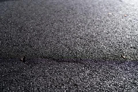 Wet asphalt road surface close up texture Stock Photos