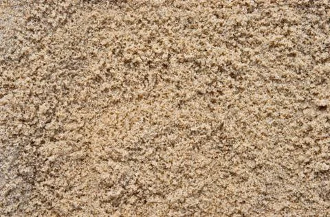 Wet beach sand Stock Photos