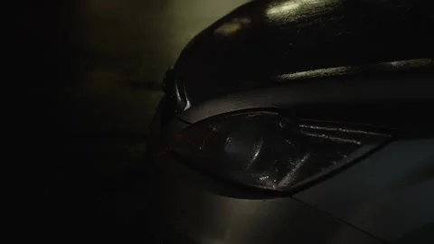 Wet car is opened remotely outside. The parking lights are flashing. Stock Footage 323697451