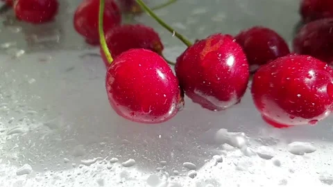 Wet cherry close up slow motion Stock Footage 216647111
