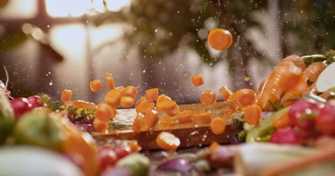 Wet chopped carrot dropping Stock Footage 311833121