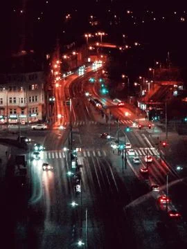 Wet city intersection at night Photos