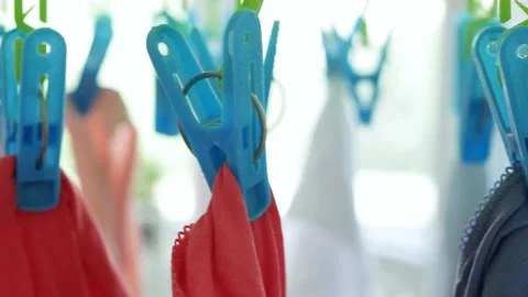 Wet Clothes Cleaned with Laundry Machine Hanging to Dry Vidéo 134067288