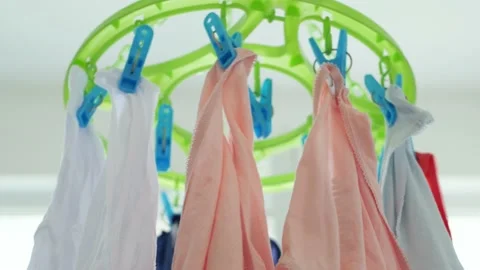 Wet Clothes Cleaned with Laundry Machine Hanging to Dry Vidéo 135541341