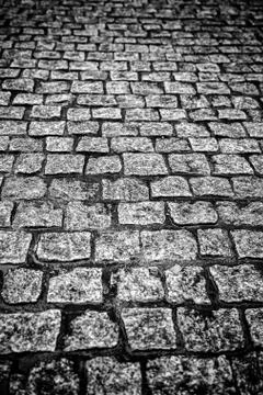 Wet cobblestone floor Stock Photos
