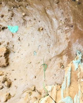 Wet colored clay. Earth natural background. Stock Photos