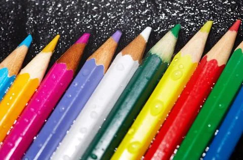 Wet crayons Stock Photos