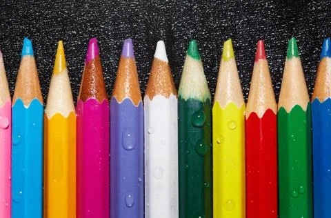 Wet crayons Stock Photos