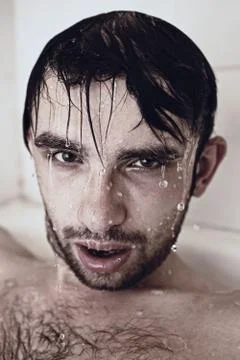 Wet face men in the shower Stock Photos